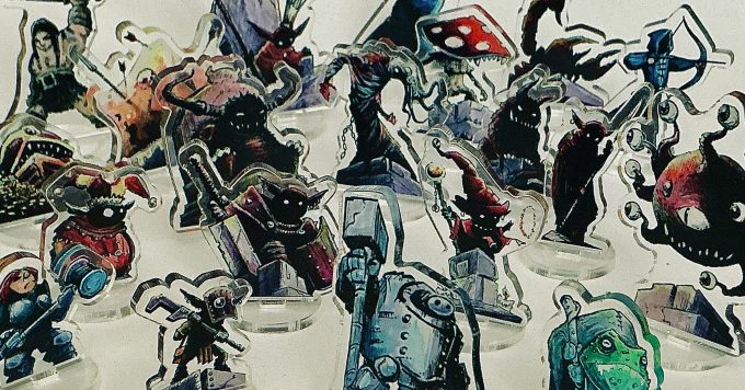 Photo en gros plan de standees acryliques - Figurines 2D imprimées sur plexiglass de personnages de fantasy -  Collection stanD&Heroes - Artiste : Lupin de Garenne (Guillaume LEHERICEY)